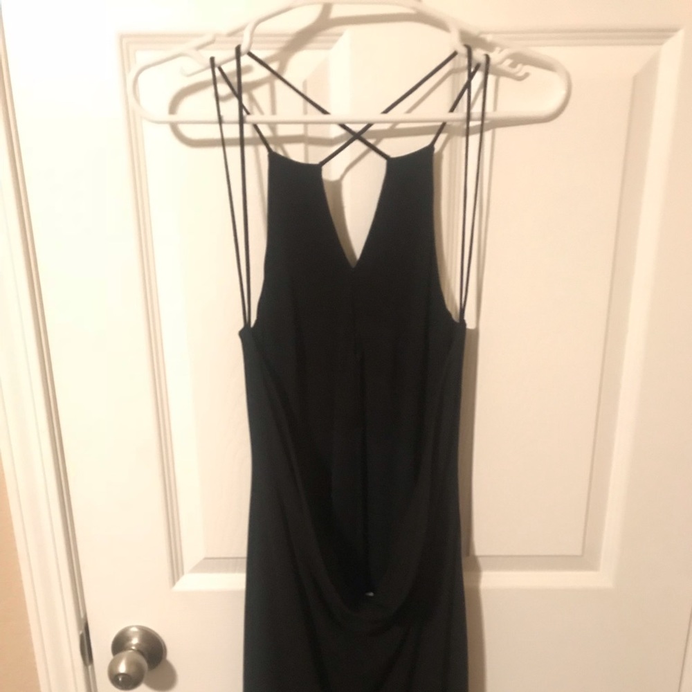 Privilege brand. Black jersey gown, with open back